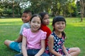 Four kids having fun in the park. Royalty Free Stock Photo