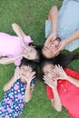 Four kids having fun in the park. Royalty Free Stock Photo