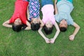 Four kids having fun in the park. Royalty Free Stock Photo