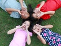 Four kids having good time in the park. Royalty Free Stock Photo