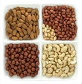 Cashews, peanuts, hazelnuts, and almonds Royalty Free Stock Photo
