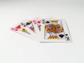 Four kings from a deck of playing cards isolated on a white background. Pik, club, diamond and heart suit