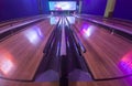 Four lane bowling alley with bumpers on for kids and beginners