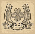 Four leaf clover, horseshoe, ribbon with text good luck. Vintage vector engraving illustration for info graphic, poster Royalty Free Stock Photo