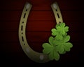 Four-leaf clover in the horseshoe Royalty Free Stock Photo