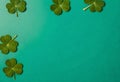 four leaf clover on a turquoise background Royalty Free Stock Photo