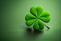 Four-leaf green clover for good luck on St. Patrick's Day, bright green background. Copy space. Generative Ai Royalty Free Stock Photo