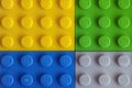 Four Lego baseplate - yellow, green, blue and gray