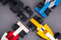 Four Lego custom race cars on road baseplate. Top view