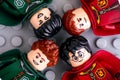 Four Lego Harry Potter minifigures from Gryffindor and Slytherin teams Royalty Free Stock Photo