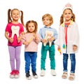 Four little children playing doctors Royalty Free Stock Photo