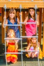 Four little girls playing on the playground Royalty Free Stock Photo