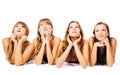 Four lovely girls laying on the floor together