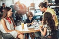 Four member family having great time in a restaurant