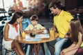 Four member family having great time in a restaurant