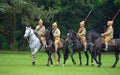 Four members of the Punjab Lancers in World War One uniform riding horses. Royalty Free Stock Photo