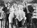 Four men at a barber shop singing Royalty Free Stock Photo