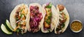 Four mexican street tacos with fish barbacoa and carnitas