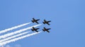 Four military planes flying in the group Royalty Free Stock Photo