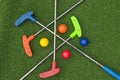 Four Mini Golf Putters and Balls Royalty Free Stock Photo