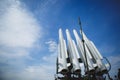 Four missiles against clear blue sky. Weapon are ready to war. Copyspace Royalty Free Stock Photo