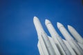Four missiles against clear blue sky. Weapon are ready to war. Copyspace Royalty Free Stock Photo