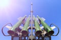 Four missiles of self-propelled system Buk M2 on blue sky background