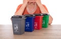 Four models of garbage sorting trash cans in front of Chinese women under careful observation Royalty Free Stock Photo