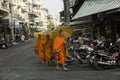 Four monks on the street