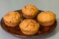 Four muffins with carrot, walnut and cinnamon Royalty Free Stock Photo