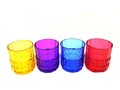 four multi-colored glasses isolated