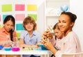 Four multi ethnic students at chemical laboratory Royalty Free Stock Photo