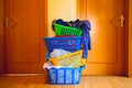 four multicolored baskets with washed laundry