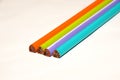 The four multicolour wooden pencils isolated in white background.background