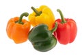 Four multicoloured bell peppers Royalty Free Stock Photo