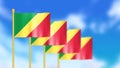 Four national flag of republic of the Congo waving in wind focused on first flag