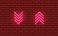 Four neon glow arrows pointing direction down and up. Light pink icon on a night red brick wall background. Vintage retro vector