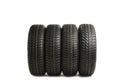 Four new black tires isolated on white background Royalty Free Stock Photo