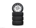Four new good-looking snow tires isolated on white background. A set of studded winter car tires. A set of wheels and tires. tire