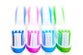 Four new multi-colored toothbrushes are Royalty Free Stock Photo