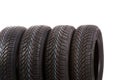 Four new tires isolated on white background Royalty Free Stock Photo