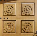 Four oak wood door elements with concentric circles