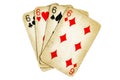Four old dirty sixes poker cards on a white background