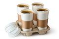 Four opened take-out coffee in holder Royalty Free Stock Photo