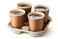 Four opened take-out coffee in holder