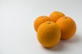 Four orange on white background Royalty Free Stock Photo