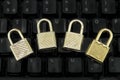 Four padlocks on the black keyboard