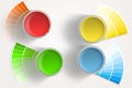 Four paint cans - yellow, red, blue, green on white background Royalty Free Stock Photo