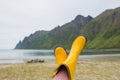 Four pair of rubber boots on the beach, Ersfjord beach, Senja Royalty Free Stock Photo