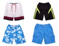 Four pairs of colored shorts isolated on white background, collage of shorts Royalty Free Stock Photo
